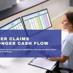 Healthcare worker reviewing billing data on dual monitors