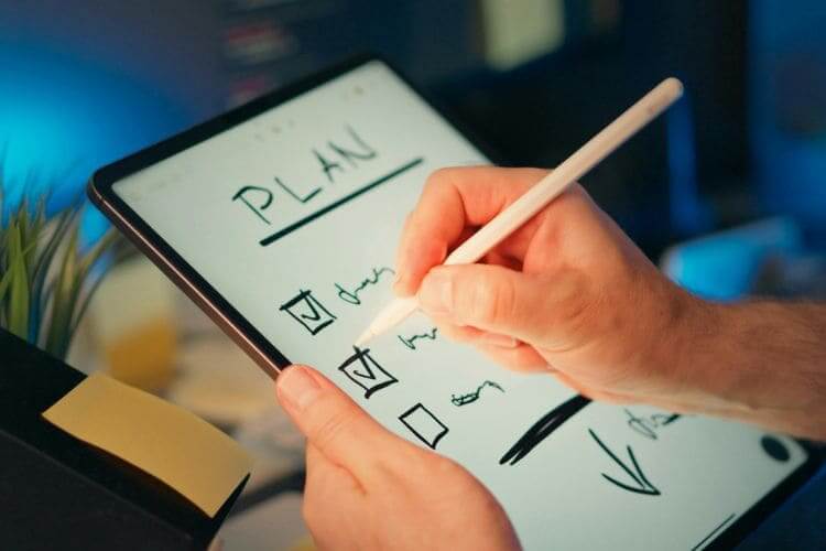 Digital tablet checklist for planning tasks and goals
