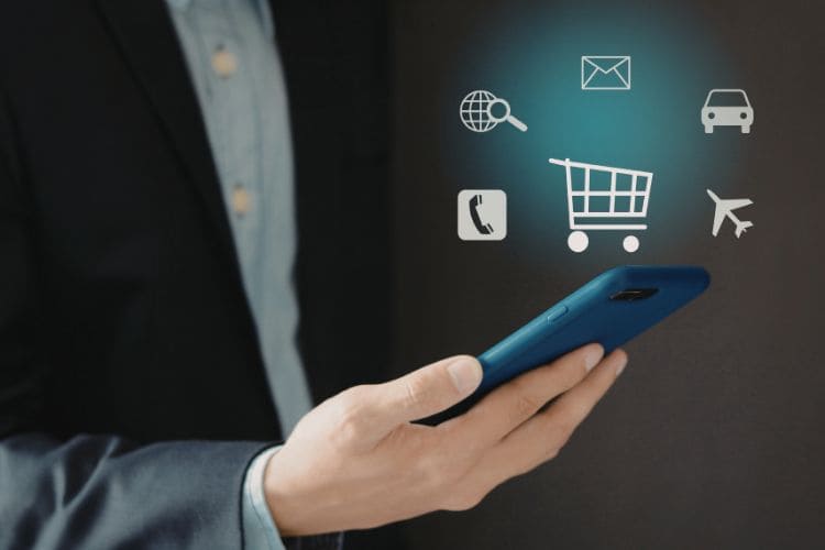 Mobile ecommerce shopping concept with smartphone and digital icons for online purchases