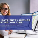 Professional data entry specialist working with spreadsheets and dual monitors in office
