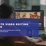 Video editor working remotely at a desktop computer.
