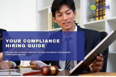 Businessman reviewing compliance hiring guide