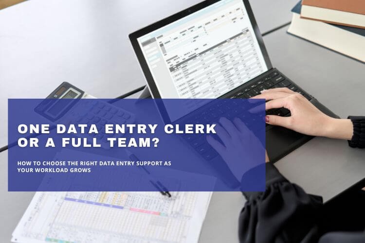 Data entry clerk working on business spreadsheets