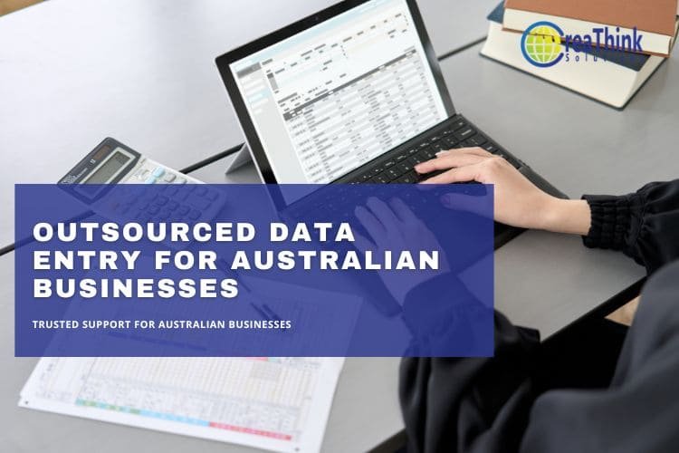 Person typing data into laptop with spreadsheets