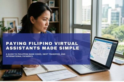 Business owner reviewing international payment options for Filipino virtual assistants on a laptop.