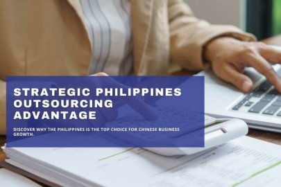 Person using a calculator and laptop for strategic Philippines outsourcing solutions.