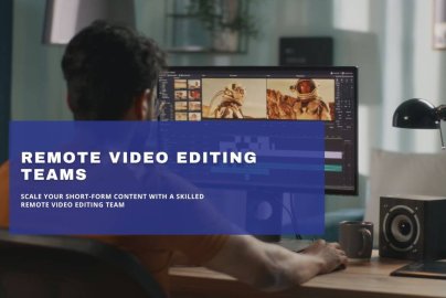 Video editor working remotely at a desktop computer.