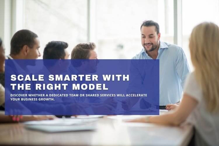 Team meeting discussing business scaling strategies